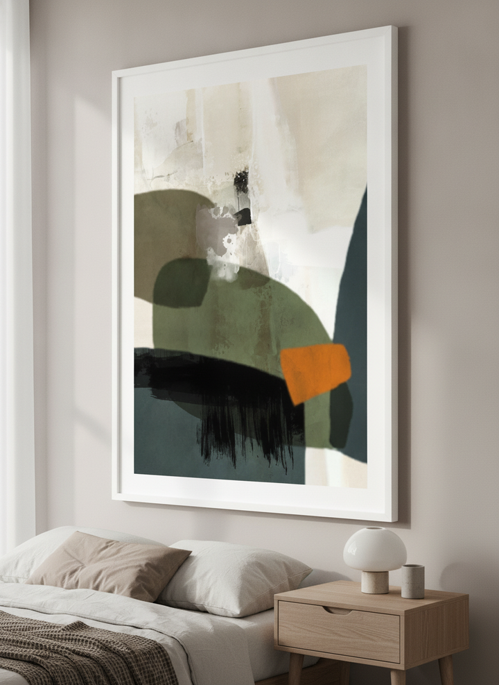 Minimalist artwork displayed in a calm, light-filled bedroom interior