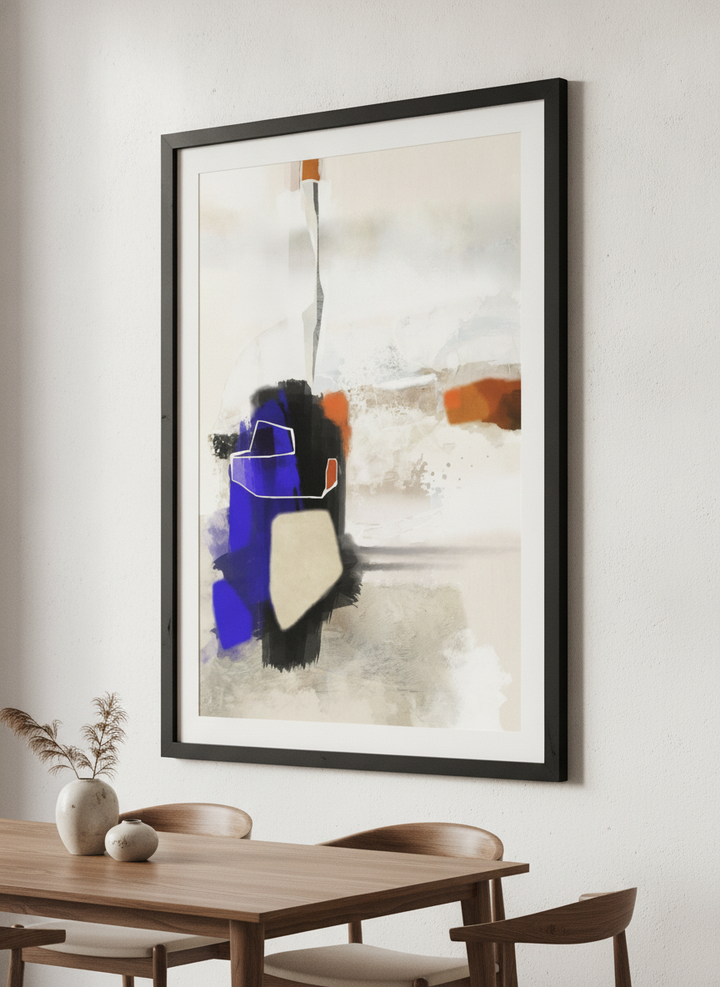 Wall art styled above a dining table in a contemporary home
