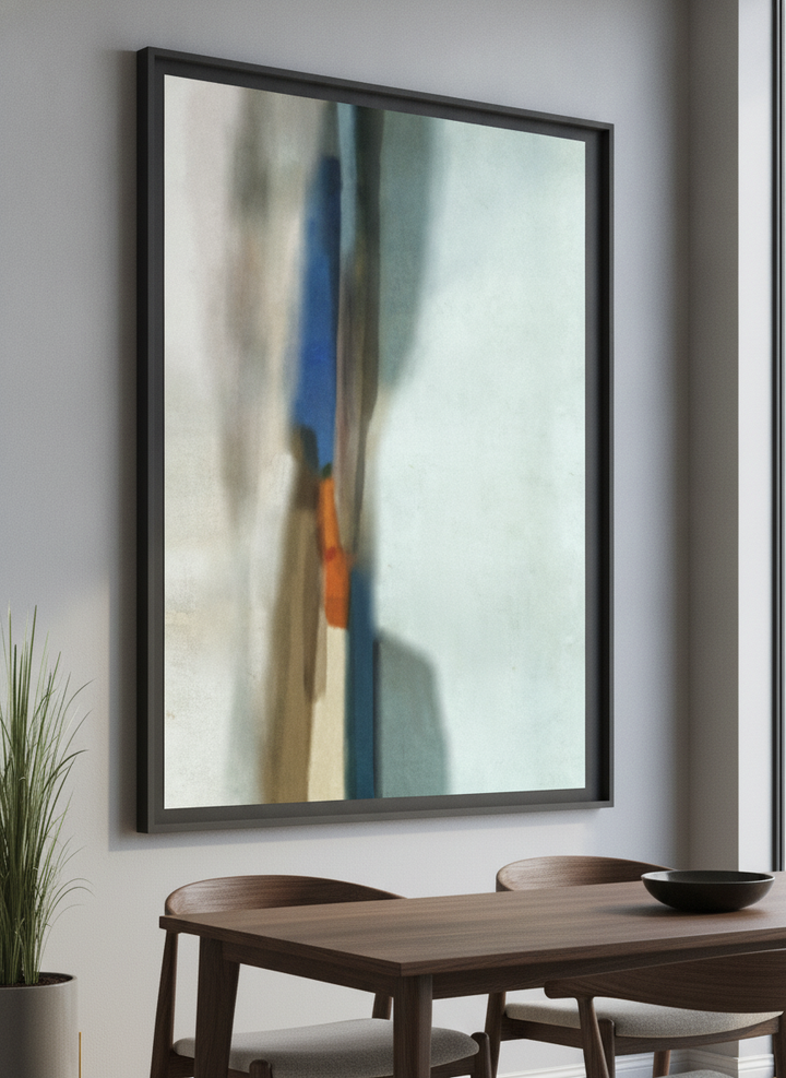 Wall art styled above a dining table in a contemporary home