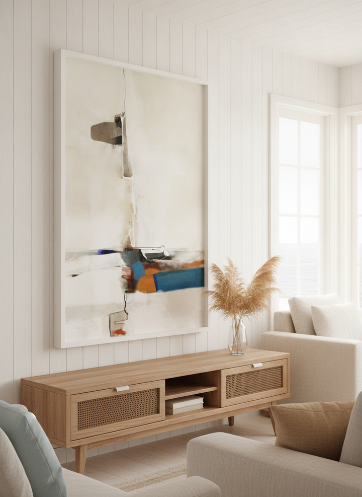 Neutral wall art displayed in a sunny coastal beach house