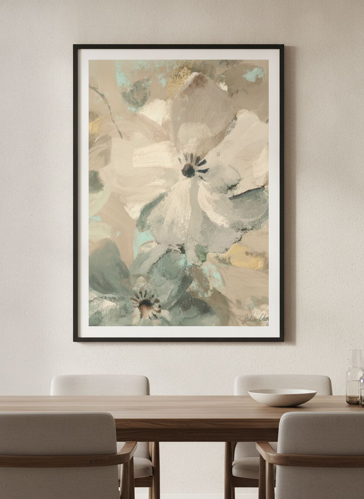Wall art styled above a dining table in a contemporary home