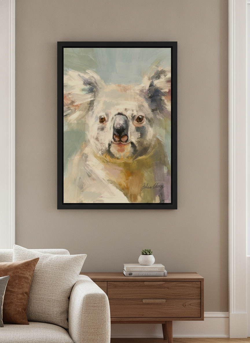 Modern wall art styled above a sofa in a neutral living room