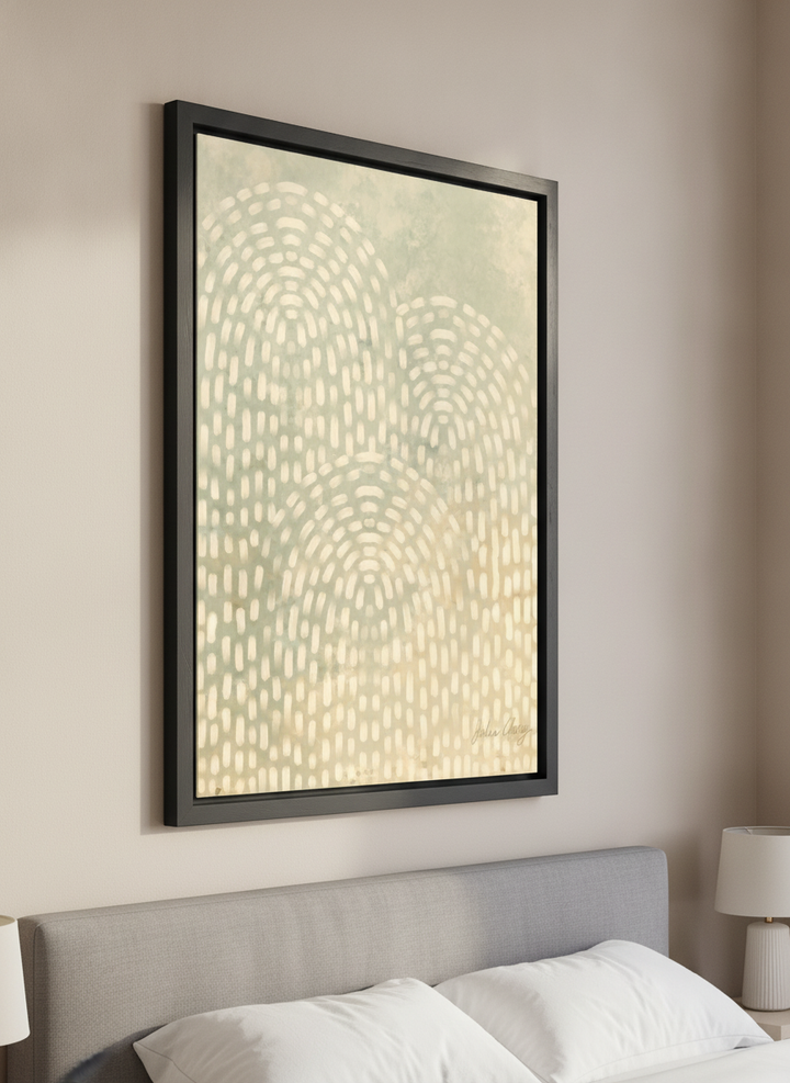 Minimalist artwork displayed in a calm, light-filled bedroom interior