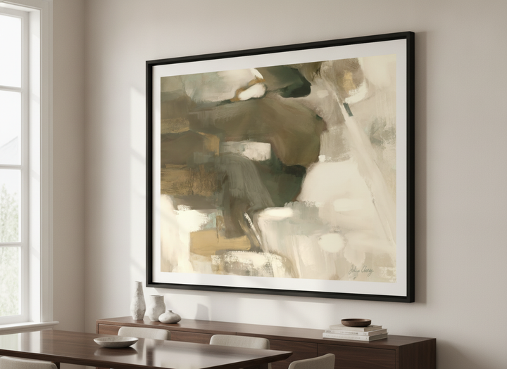 Wall art styled above a dining table in a contemporary home