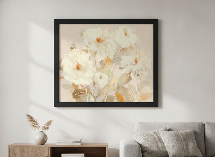 Modern wall art styled above a sofa in a neutral living room