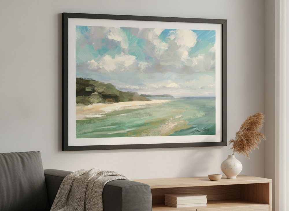 Modern wall art styled above a sofa in a neutral living room