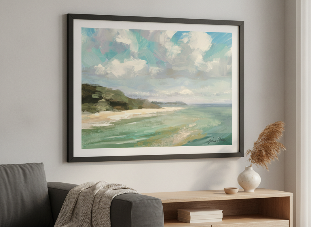 Modern wall art styled above a sofa in a neutral living room