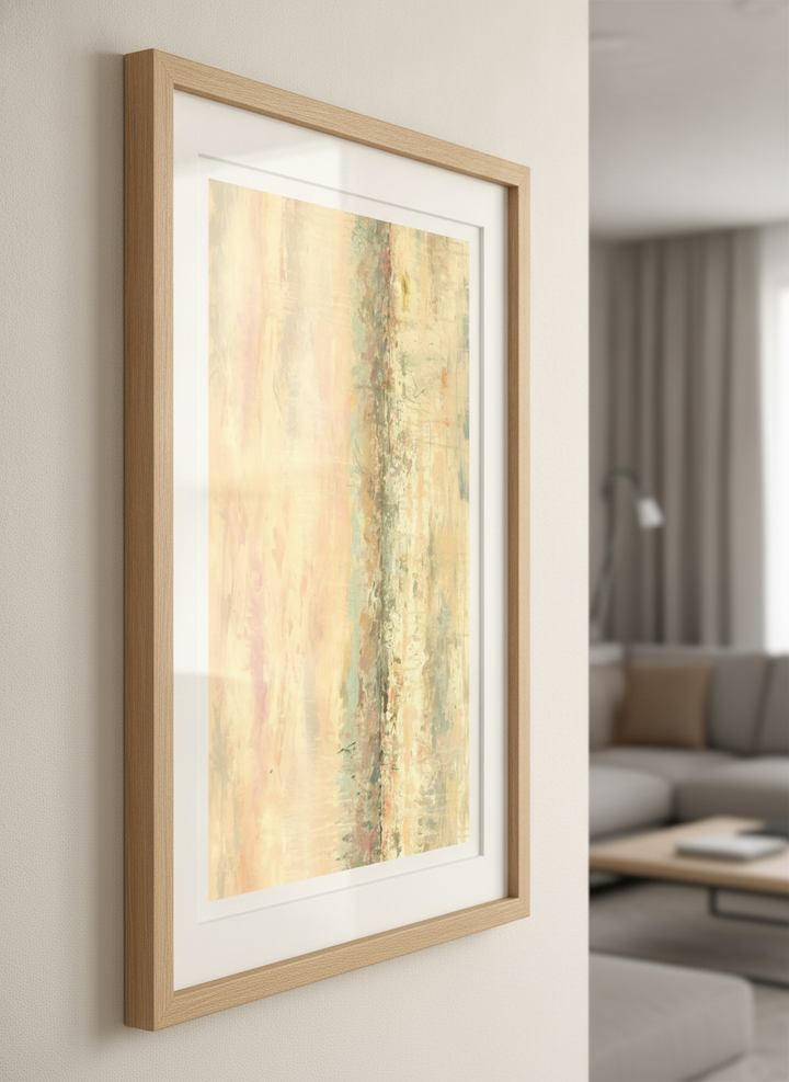 Modern wall art styled above a sofa in a neutral living room