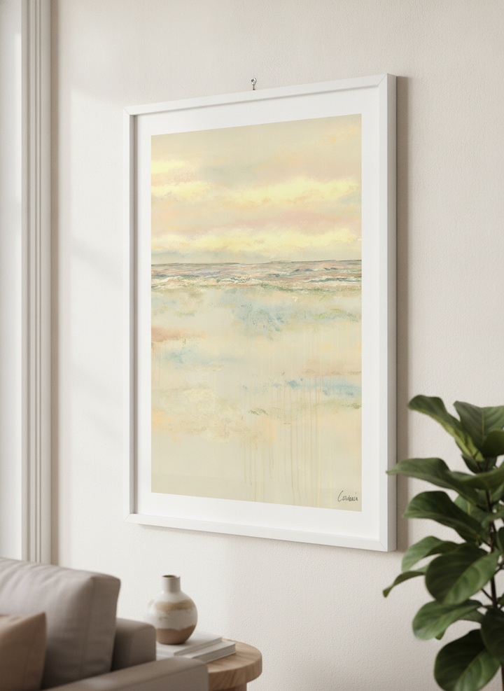 Modern wall art styled above a sofa in a neutral living room