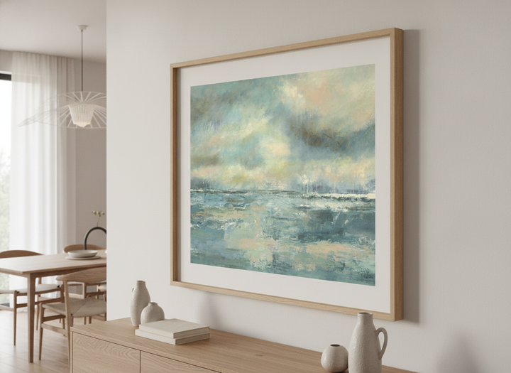 Wall art styled above a dining table in a contemporary home