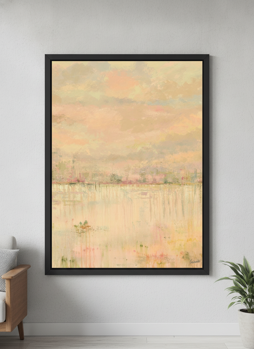 Modern wall art styled above a sofa in a neutral living room