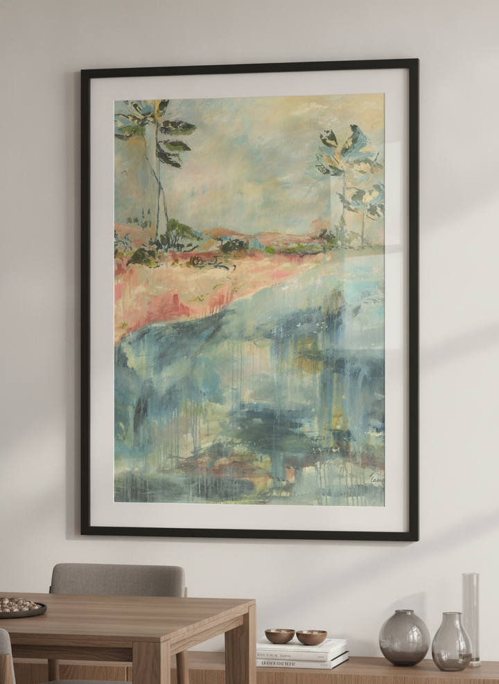Wall art styled above a dining table in a contemporary home