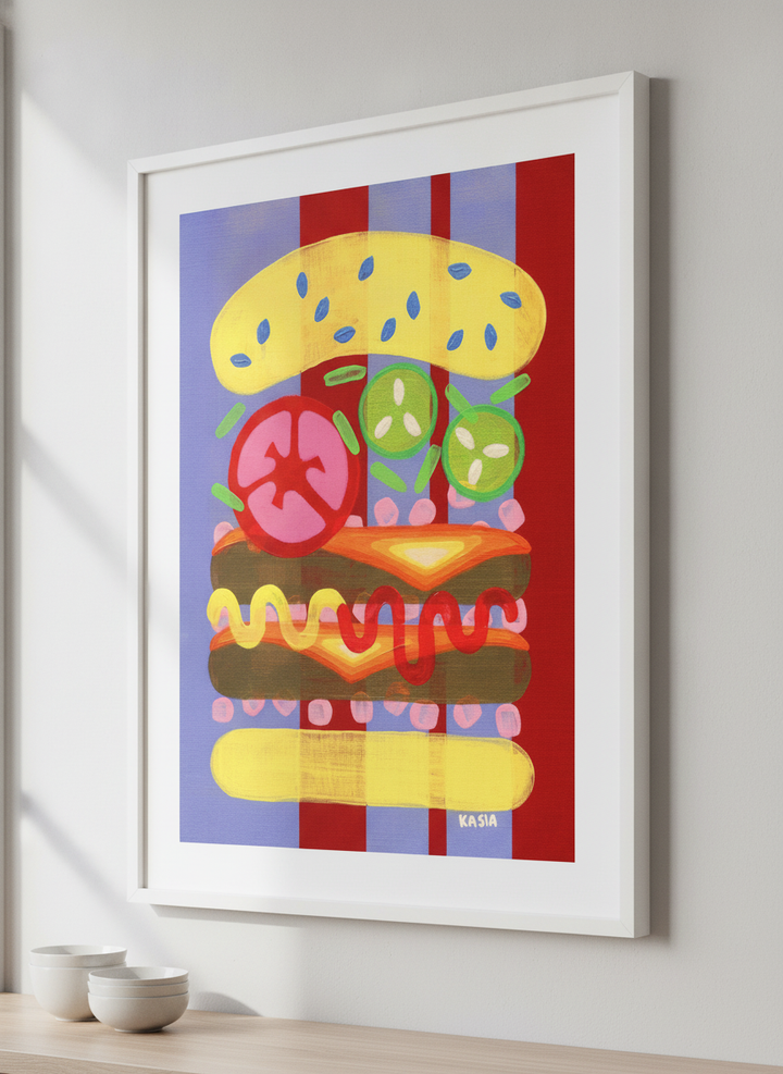 Artwork styled on the wall of a bright modern kitchen