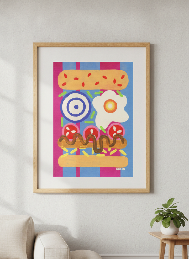 Modern wall art styled above a sofa in a neutral living room