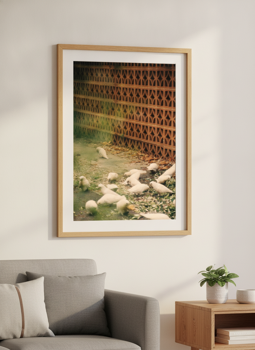 Modern wall art styled above a sofa in a neutral living room