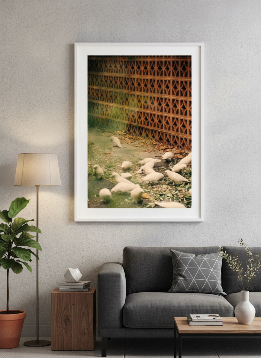 Modern wall art styled above a sofa in a neutral living room