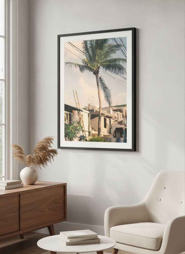 Modern wall art styled above a sofa in a neutral living room