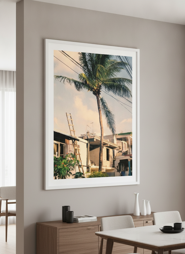 Wall art styled above a dining table in a contemporary home