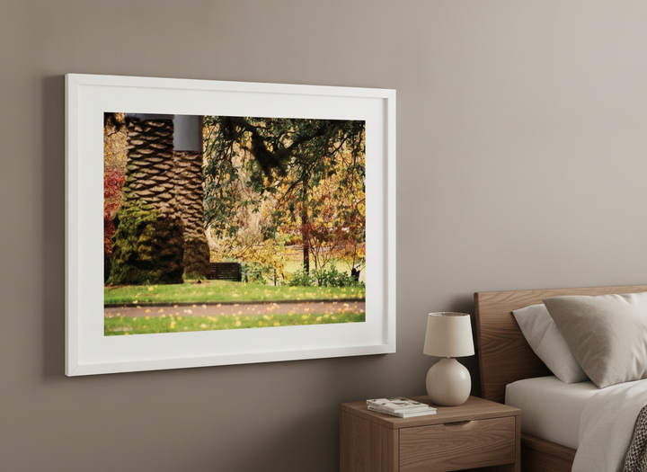 Minimalist artwork displayed in a calm, light-filled bedroom interior