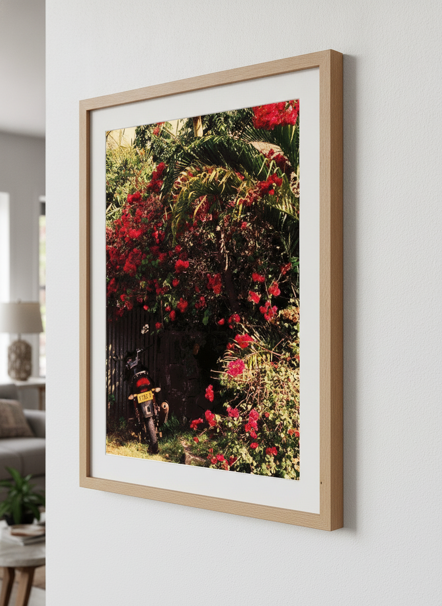 Modern wall art styled above a sofa in a neutral living room