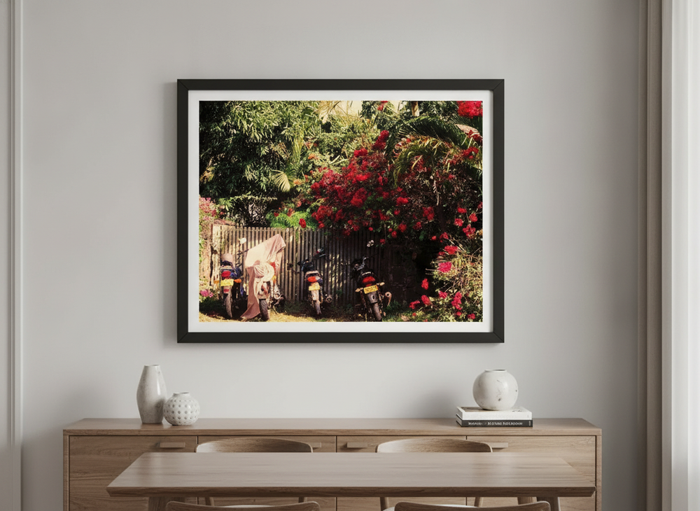 Wall art styled above a dining table in a contemporary home