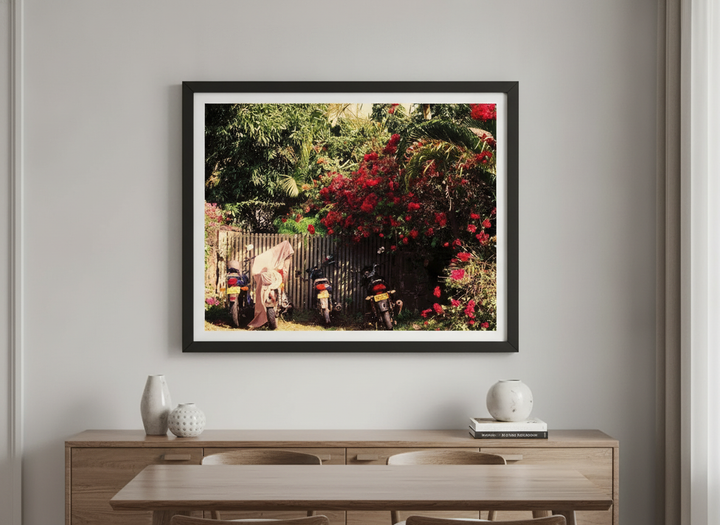 Wall art styled above a dining table in a contemporary home