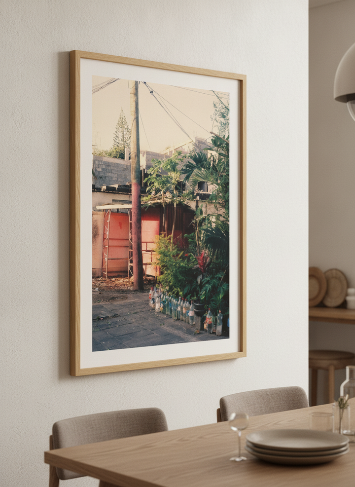 Wall art styled above a dining table in a contemporary home