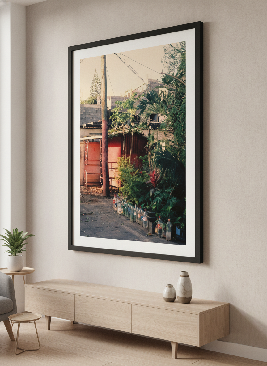 Modern wall art styled above a sofa in a neutral living room