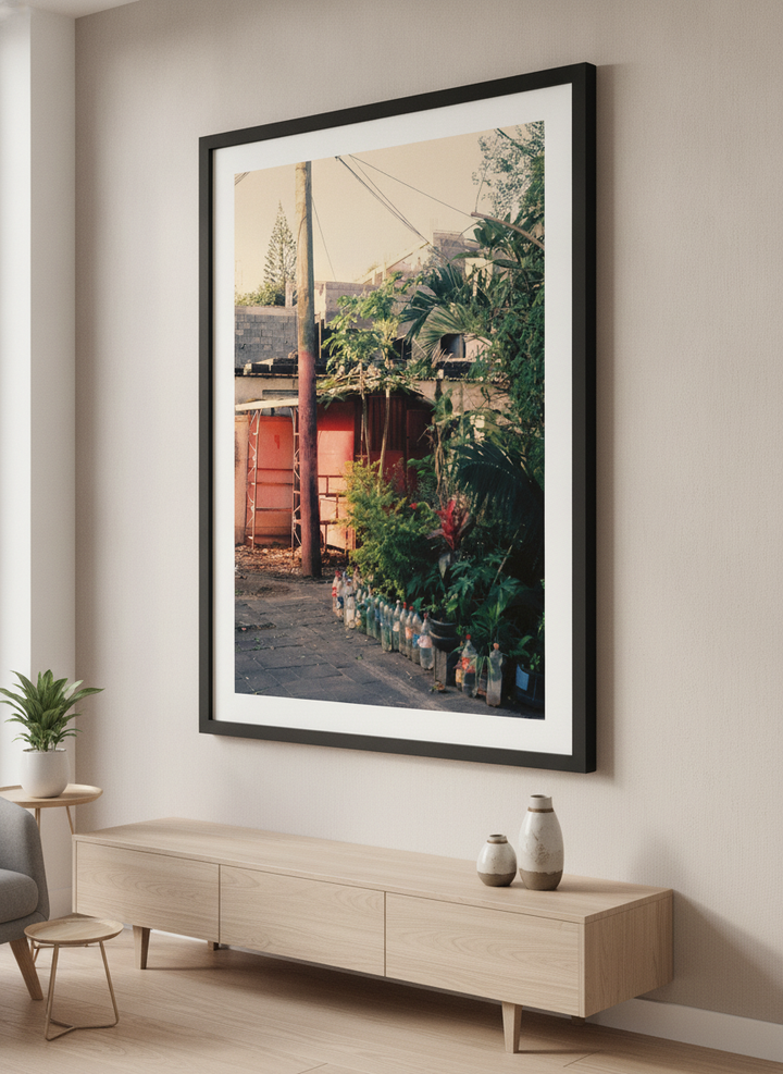 Modern wall art styled above a sofa in a neutral living room