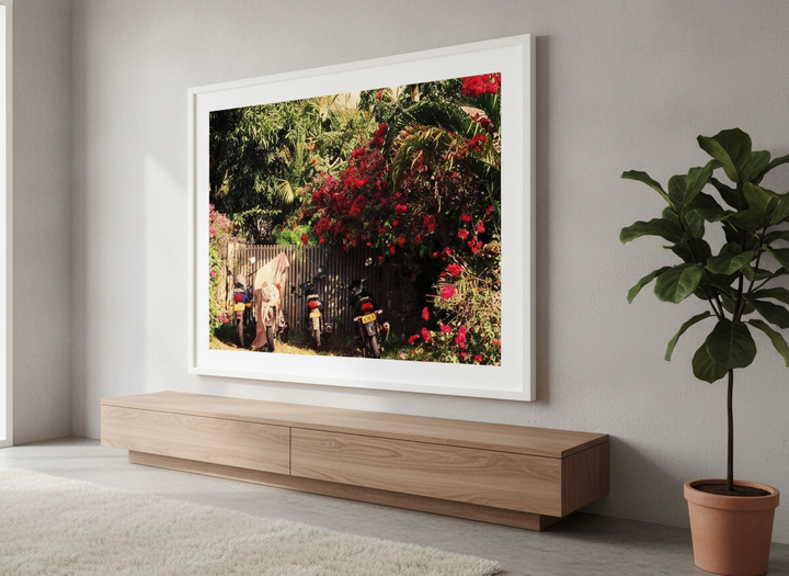 Modern wall art styled above a sofa in a neutral living room