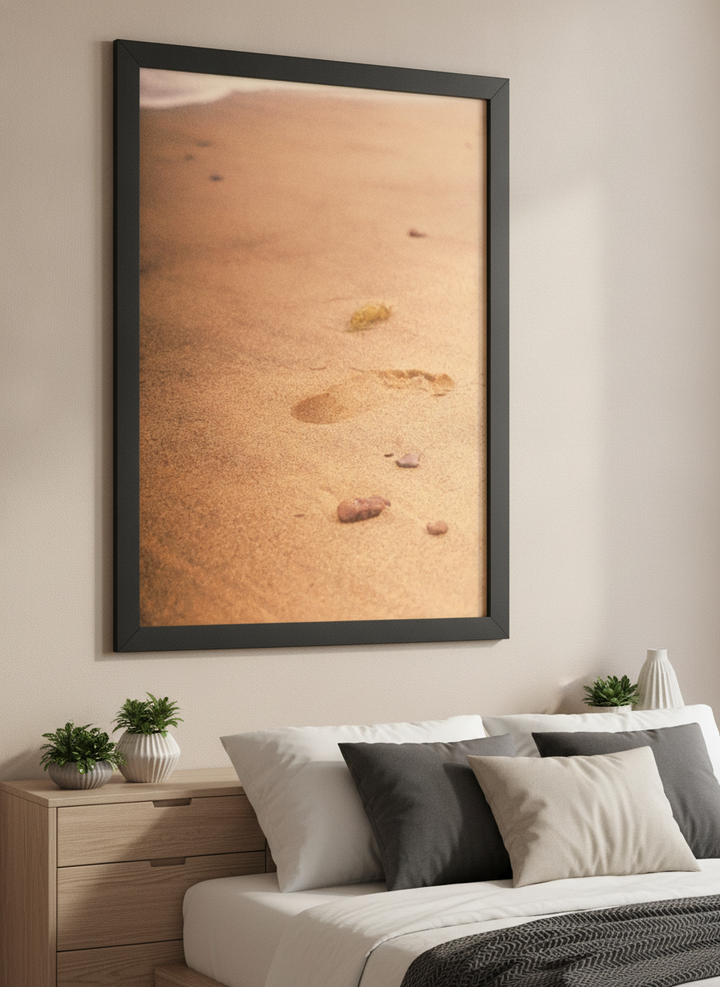 Minimalist artwork displayed in a calm, light-filled bedroom interior