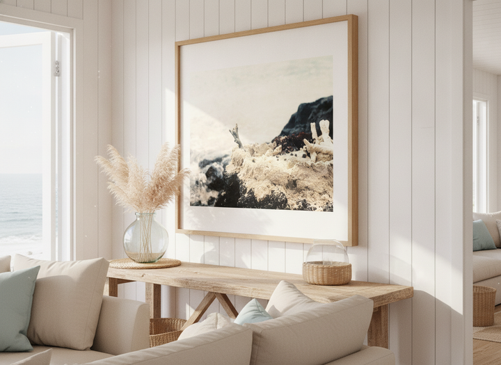 Neutral wall art displayed in a sunny coastal beach house