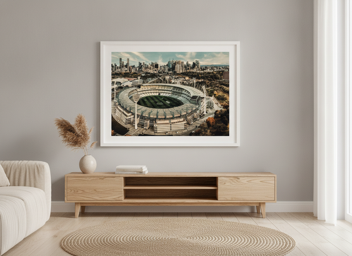 Modern wall art styled above a sofa in a neutral living room