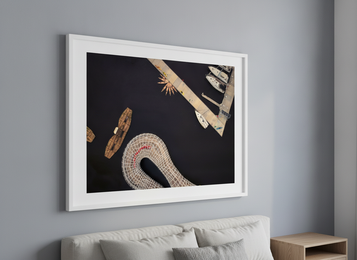 Minimalist artwork displayed in a calm, light-filled bedroom interior