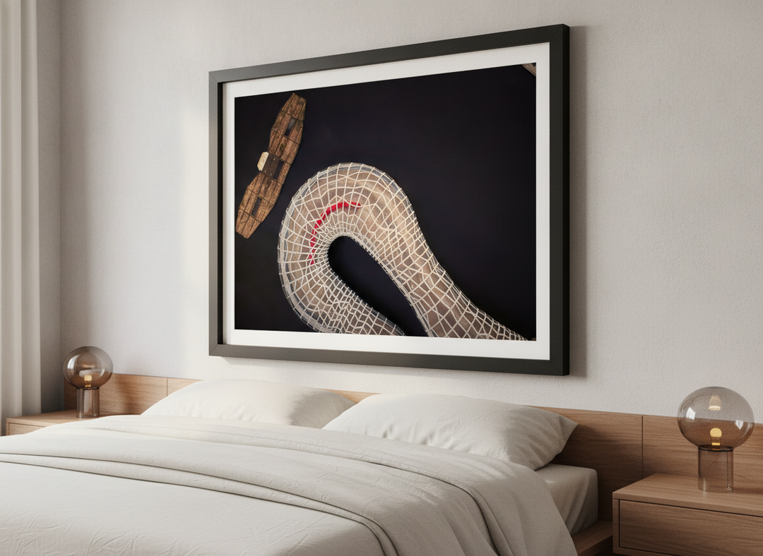 Minimalist artwork displayed in a calm, light-filled bedroom interior