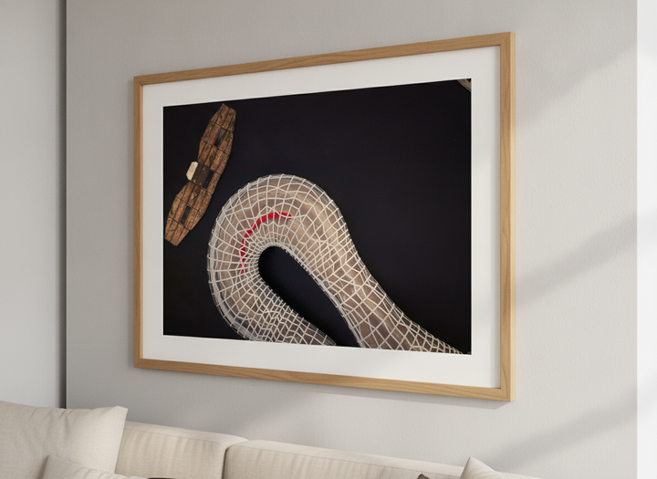Modern wall art styled above a sofa in a neutral living room