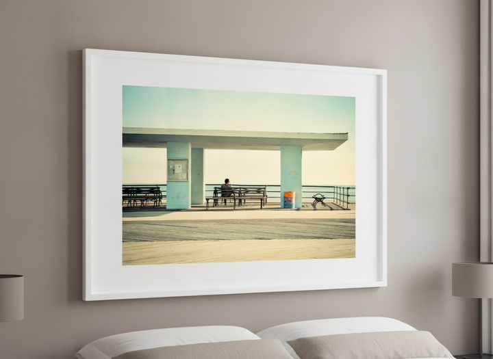 Minimalist artwork displayed in a calm, light-filled bedroom interior