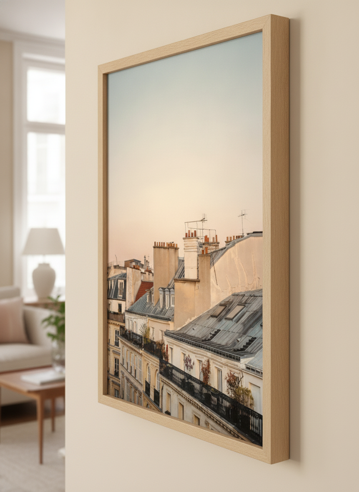 Modern wall art styled above a sofa in a neutral living room