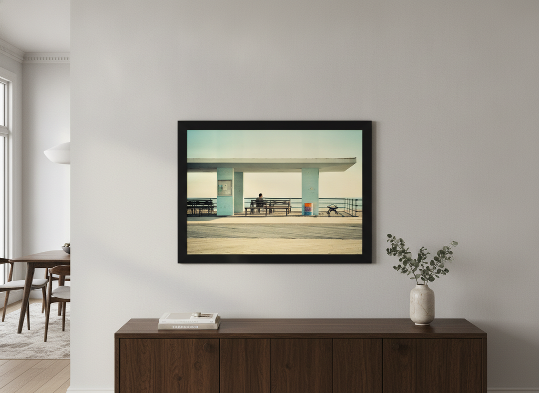 Wall art styled above a dining table in a contemporary home