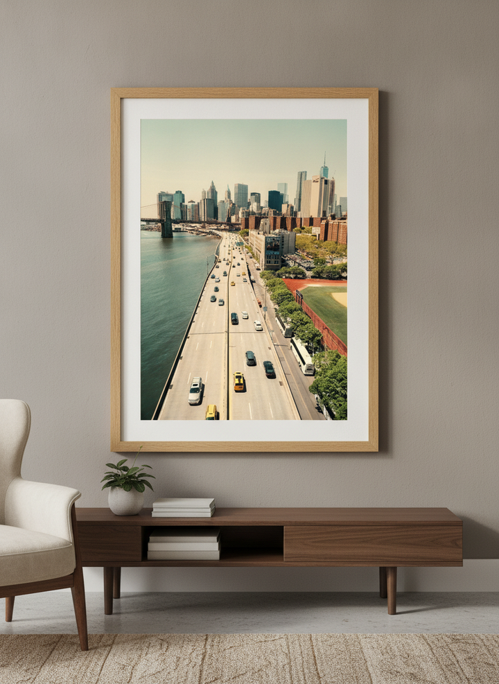 Modern wall art styled above a sofa in a neutral living room