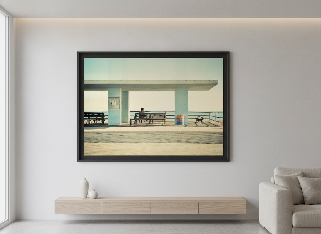 Modern wall art styled above a sofa in a neutral living room