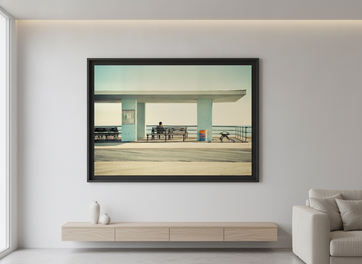 Modern wall art styled above a sofa in a neutral living room