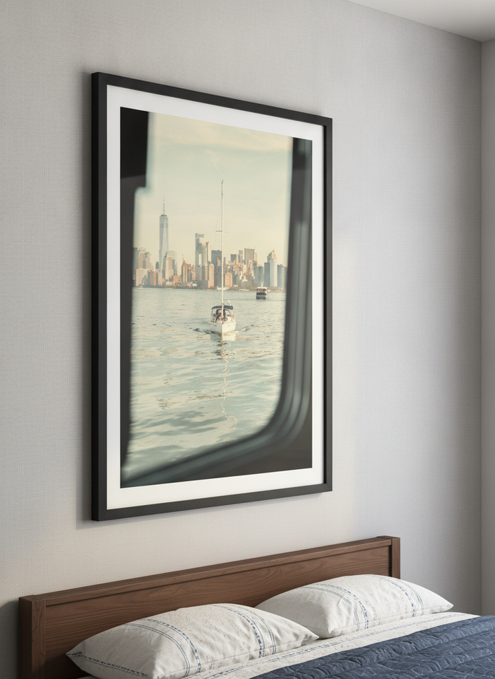 Minimalist artwork displayed in a calm, light-filled bedroom interior