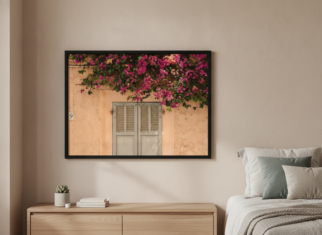 Minimalist artwork displayed in a calm, light-filled bedroom interior