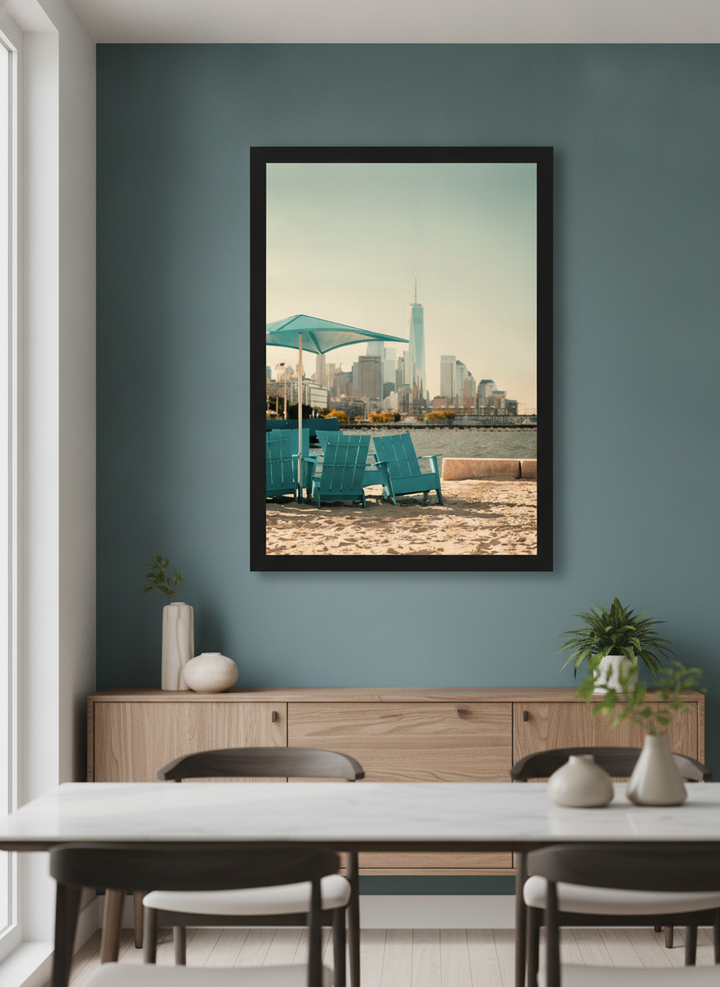 Wall art styled above a dining table in a contemporary home
