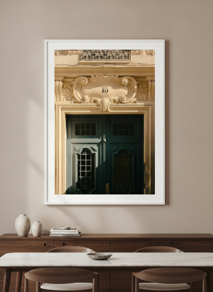 Wall art styled above a dining table in a contemporary home