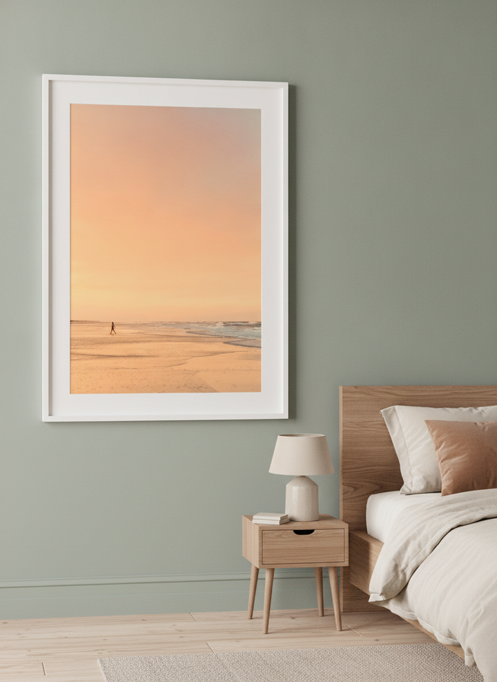 Minimalist artwork displayed in a calm, light-filled bedroom interior