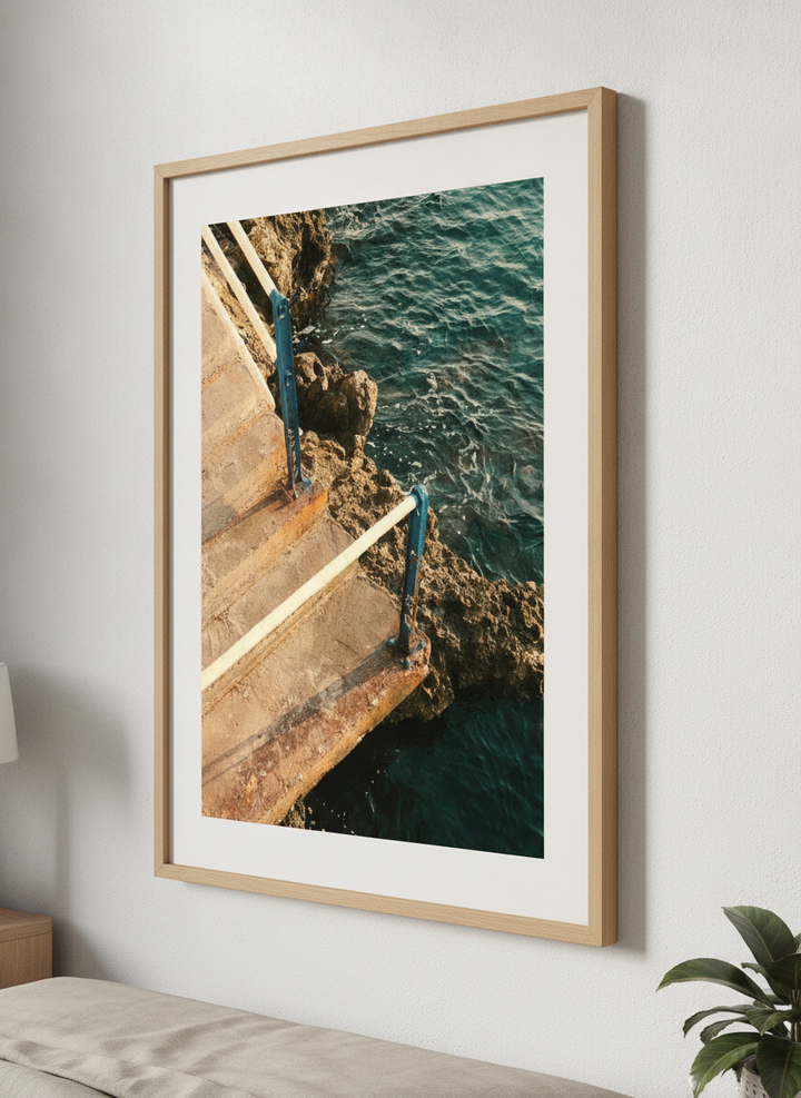 Minimalist artwork displayed in a calm, light-filled bedroom interior
