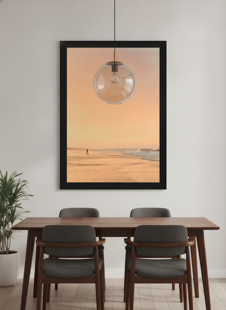 Wall art styled above a dining table in a contemporary home