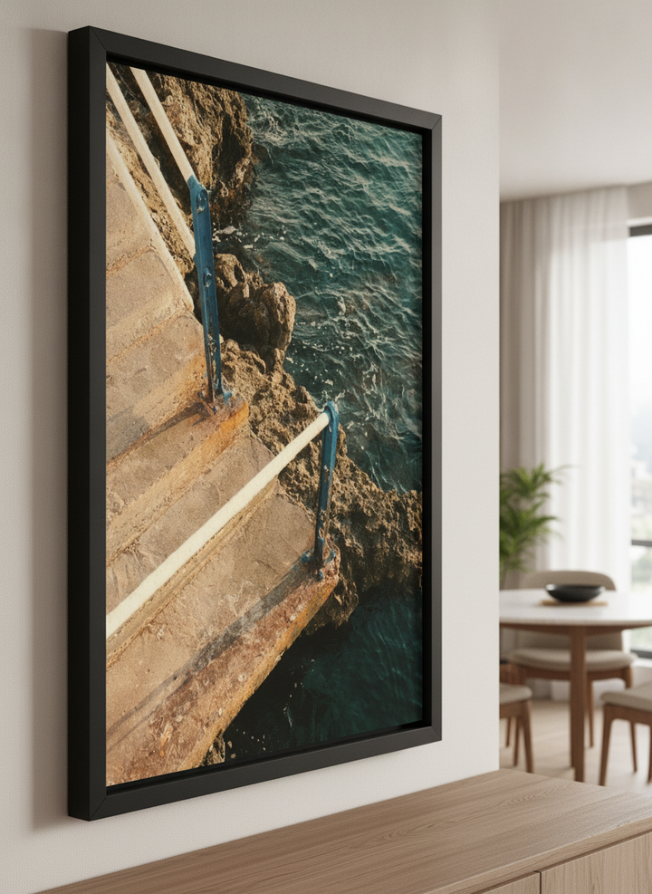Wall art styled above a dining table in a contemporary home